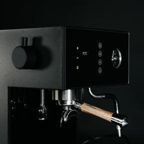 Arkel Tide black espresso machine left perspective with wooden handle portafilter